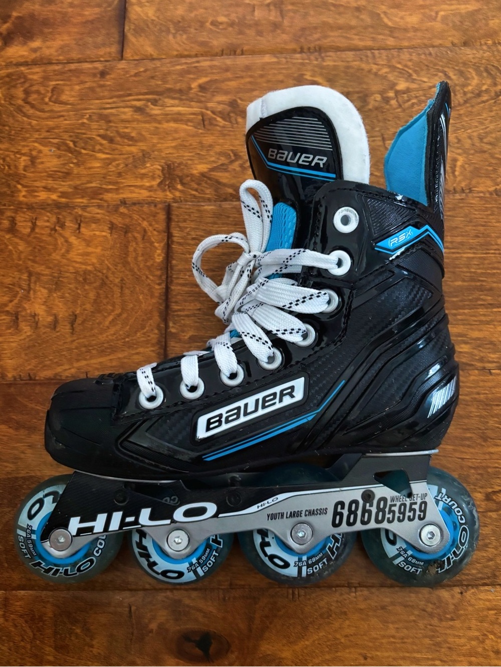 Bauer Black and Blue Inline Hockey Skates with White Laces - Picture 4 of 5